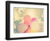 A Person Holding Multi Colored Balloons Done with a Retro Vintage Instagram Filter-graphicphoto-Framed Photographic Print