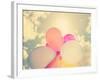 A Person Holding Multi Colored Balloons Done with a Retro Vintage Instagram Filter-graphicphoto-Framed Photographic Print