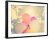 A Person Holding Multi Colored Balloons Done with a Retro Vintage Instagram Filter-graphicphoto-Framed Photographic Print