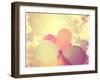 A Person Holding Multi Colored Balloons Toned with a Retro Vintage Instagram like Filter-graphicphoto-Framed Photographic Print