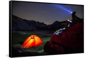 A person looks at stars near his red tent, Unterer Segnesboden, Flims, Switzerland-Francesco Bergamaschi-Framed Stretched Canvas