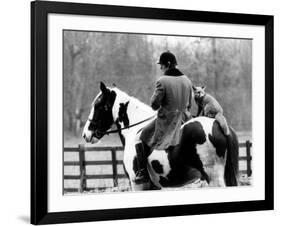 A Pet Fox Sits on the Horse of Its Owner-null-Framed Photographic Print