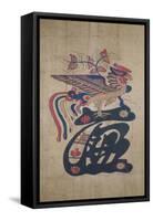 A Phoenix Perched on a Large Stylised Character Among Flowers and Foliage-null-Framed Stretched Canvas