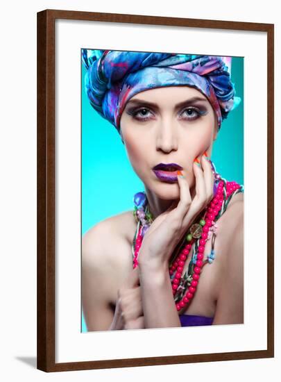 A Photo of Beautiful Girl in a Head-Dress from the Coloured Fabric,On a Blue Background Glamour-Pandorabox-Framed Photographic Print