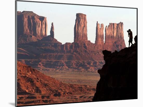 A Photographer at Monument Valley in the Navajo Nation, Ariz.-null-Mounted Premium Photographic Print
