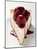 A Piece of Cheesecake with Cherry Sauce-null-Mounted Photographic Print