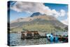 A pier and boat at the base of Volcan Imbabura and Lago San Pablo, close to the famous market town -Alexandre Rotenberg-Stretched Canvas