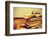 A Pile of Books and a Pair of Eyeglasses in an Old Suitcase, with a Retro Effect-nito-Framed Photographic Print