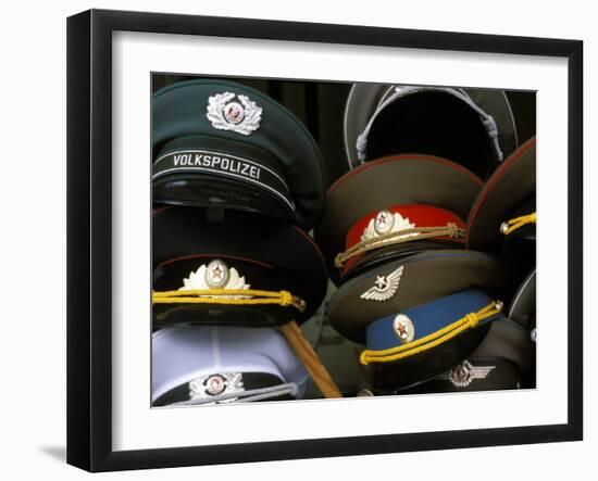 A Pile of Communist Era Army and Police Hats for Sale as Souvenirs, Mitte, Berlin, Germany-Richard Nebesky-Framed Photographic Print