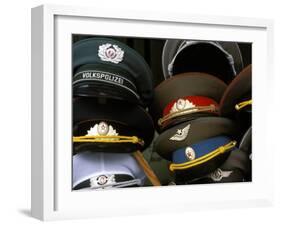 A Pile of Communist Era Army and Police Hats for Sale as Souvenirs, Mitte, Berlin, Germany-Richard Nebesky-Framed Photographic Print