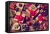 A Pile of Gifts and Christmas Ornaments, such as Christmas Balls, Stars and Tinsel, on a Rustic Woo-nito-Framed Stretched Canvas