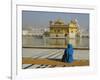 A Pilgrim in Blue Sits by the Holy Pool of Nectar at the Golden Temple, Punjab, India-Jeremy Bright-Framed Photographic Print