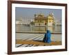 A Pilgrim in Blue Sits by the Holy Pool of Nectar at the Golden Temple, Punjab, India-Jeremy Bright-Framed Photographic Print