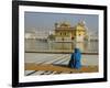 A Pilgrim in Blue Sits by the Holy Pool of Nectar at the Golden Temple, Punjab, India-Jeremy Bright-Framed Photographic Print