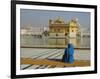 A Pilgrim in Blue Sits by the Holy Pool of Nectar at the Golden Temple, Punjab, India-Jeremy Bright-Framed Photographic Print