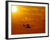 A Pilot Flies a Small Plane Past the Setting Sun Over Lake Winnipesaukee-null-Framed Photographic Print