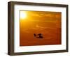 A Pilot Flies a Small Plane Past the Setting Sun Over Lake Winnipesaukee-null-Framed Photographic Print