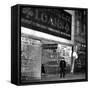 A Policeman Stands in Front of a Pawn Shop-null-Framed Stretched Canvas