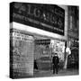 A Policeman Stands in Front of a Pawn Shop-null-Stretched Canvas