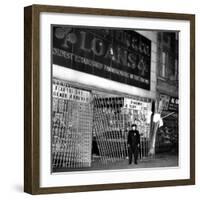 A Policeman Stands in Front of a Pawn Shop-null-Framed Photographic Print