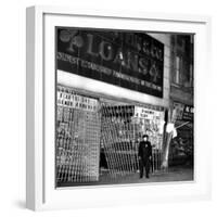 A Policeman Stands in Front of a Pawn Shop-null-Framed Photographic Print