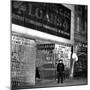 A Policeman Stands in Front of a Pawn Shop-null-Mounted Photographic Print