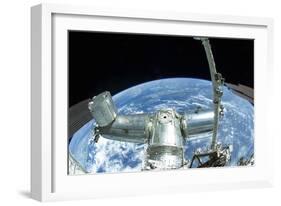 A Portion of the International Space Station Backdropped by Earth's Horizon-null-Framed Photographic Print