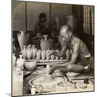 A Potter and His Wheel, Fashioning a Vase of Awata Porcelain, Kinkosan Works, Kyoto, Japan, 1904-Underwood & Underwood-Mounted Photographic Print