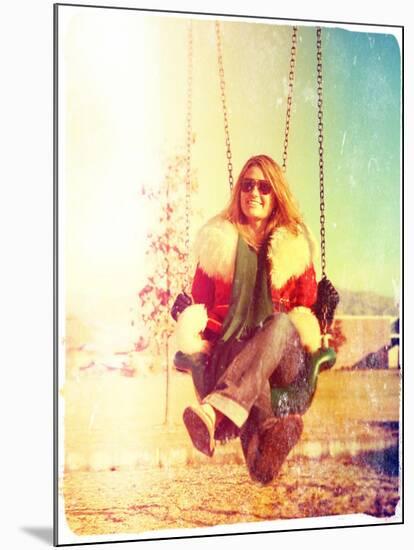 A Pretty Woman Sitting in a Swing-graphicphoto-Mounted Photographic Print