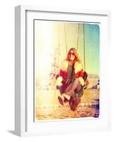 A Pretty Woman Sitting in a Swing-graphicphoto-Framed Photographic Print