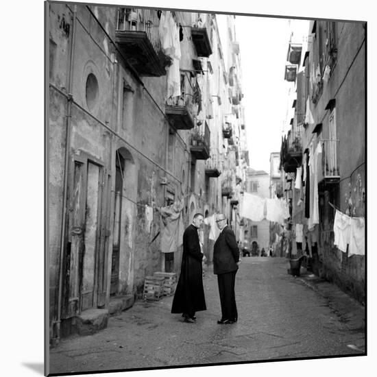 A Priest Chats to an Elderly Man in a Street, Naples, Italy 1957-null-Mounted Photographic Print