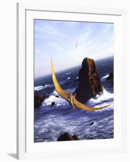 A Pteranodon Soars Above the Ocean and Rocks-null-Framed Art Print