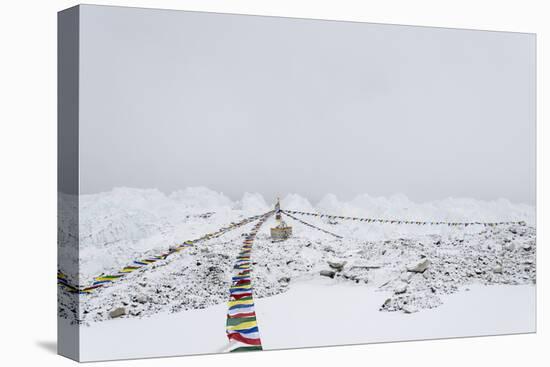 A puja adorned with prayer flags on Khumbu glacier, Everest Base Camp, Khumbu, Nepal, Himalayas-Alex Treadway-Stretched Canvas