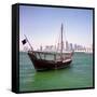 A Qatari Sailing Dhow, Called a Boom or Boum, with the National Flag Flying and the Doha Skyline-PaulCowan-Framed Stretched Canvas