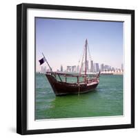 A Qatari Sailing Dhow, Called a Boom or Boum, with the National Flag Flying and the Doha Skyline-PaulCowan-Framed Photographic Print