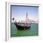 A Qatari Sailing Dhow, Called a Boom or Boum, with the National Flag Flying and the Doha Skyline-PaulCowan-Framed Photographic Print