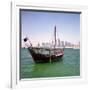 A Qatari Sailing Dhow, Called a Boom or Boum, with the National Flag Flying and the Doha Skyline-PaulCowan-Framed Photographic Print