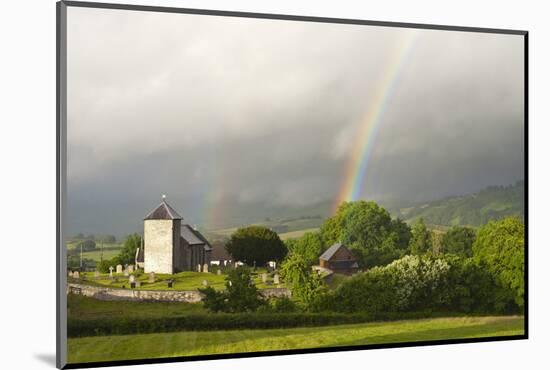 A Rainbow over St. David's Church in the Tiny Welsh Hamlet of Llanddewir Cwm, Powys, Wales-Graham Lawrence-Mounted Photographic Print