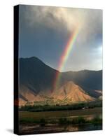 A Rainbow Reaches for the Banks of Kashmir's Dal Lake-null-Stretched Canvas