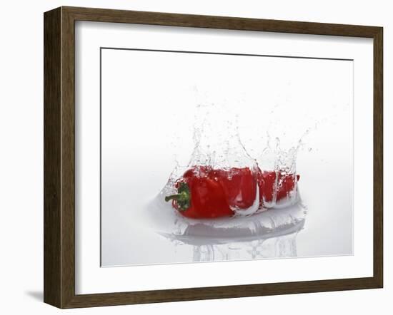A Red Chilli Pepper Falling into Water-Kröger & Gross-Framed Photographic Print
