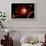 A Red Giant Star System-null-Framed Art Print displayed on a wall