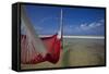 A Red Hammock Spread Out by the Wind Swings Above the Water During Low Tide, Hobox Island, Mexico-Karine Aigner-Framed Stretched Canvas