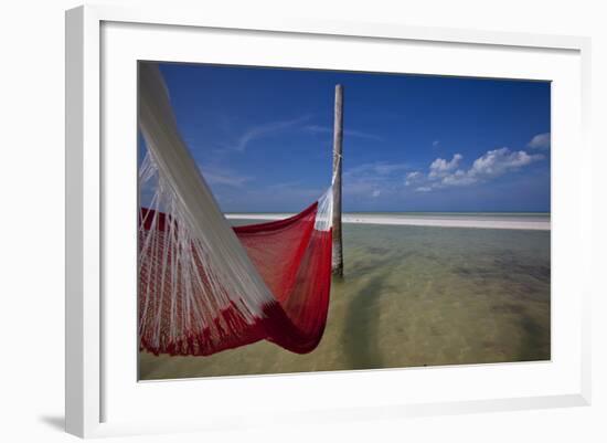 A Red Hammock Spread Out by the Wind Swings Above the Water During Low Tide, Hobox Island, Mexico-Karine Aigner-Framed Photographic Print