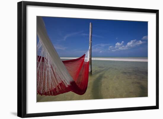 A Red Hammock Spread Out by the Wind Swings Above the Water During Low Tide, Hobox Island, Mexico-Karine Aigner-Framed Photographic Print