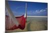 A Red Hammock Spread Out by the Wind Swings Above the Water During Low Tide, Hobox Island, Mexico-Karine Aigner-Mounted Photographic Print