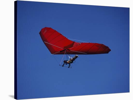 A Red Hang Glider-null-Stretched Canvas