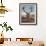 A Red Stag Adorns Himself with Foliage on a Winter Morning in Richmond Park-Alex Saberi-Framed Photographic Print displayed on a wall