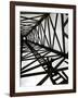 A Reenactor is Silhouetted Inside a Replica of the Spindletop Oil Derrick-null-Framed Photographic Print