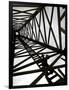 A Reenactor is Silhouetted Inside a Replica of the Spindletop Oil Derrick-null-Framed Photographic Print