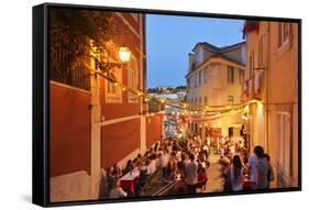 A Restaurant in the Calcada Do Duque, with a View to Sao Jorge Castle at Twilight. Lisbon, Portugal-Mauricio Abreu-Framed Stretched Canvas